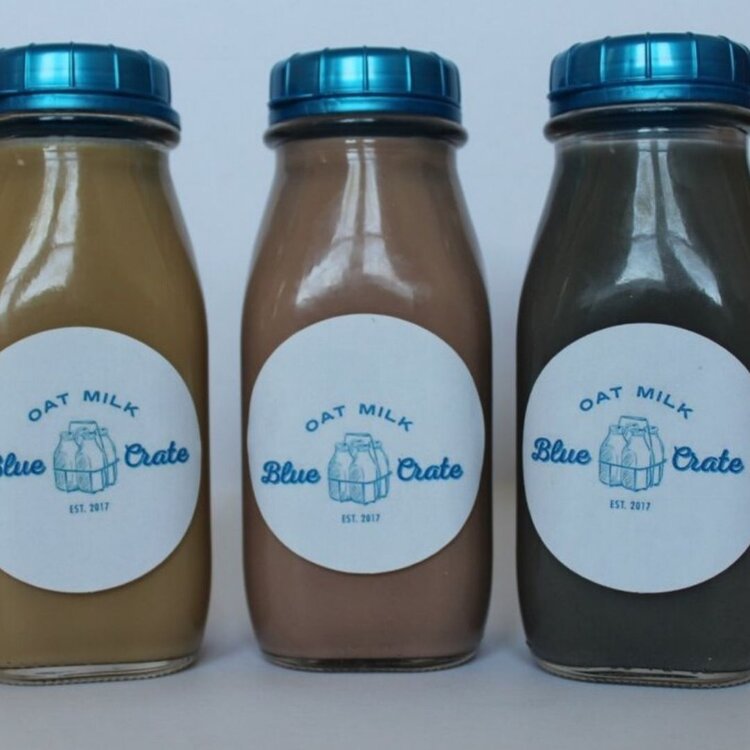 Blue Crate Oat Milk’s three flavors:  Cold Brew, Chocolate Protein, and Charcoal Detox.